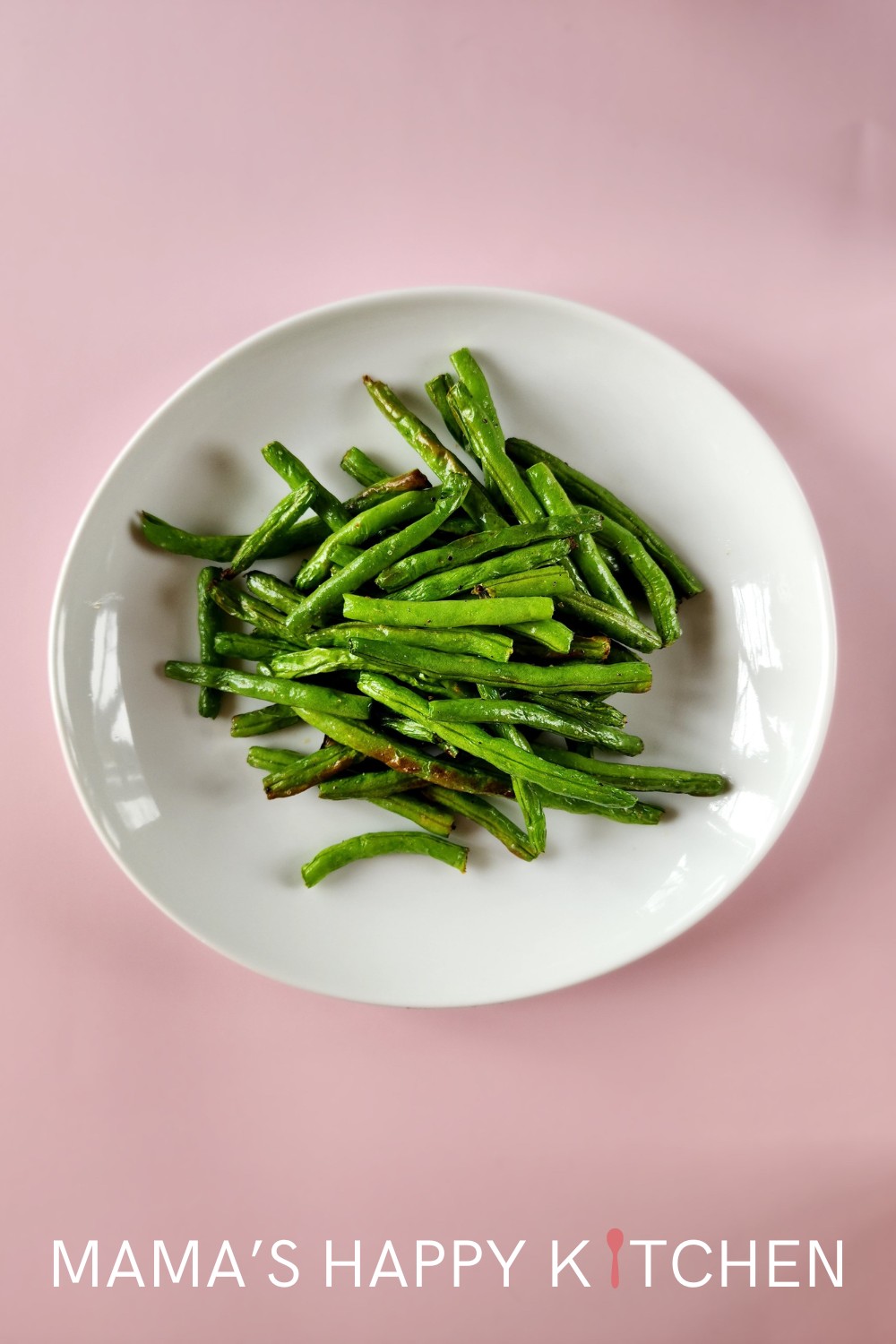 Every summer, I harvest so many green beans from my garden. This air fryer green beans recipe is super simple to make to use up that great bounty. I love fresh green beans (I also love canned green beans, too!), and I throw them into everything. There is just something so satisfying about eating something that you've grown yourself. Green beans are also healthy. In just 10 minutes, you have a delicious snack, side dish, or appetizer. You can even freeze fresh green beans and air fry those too!