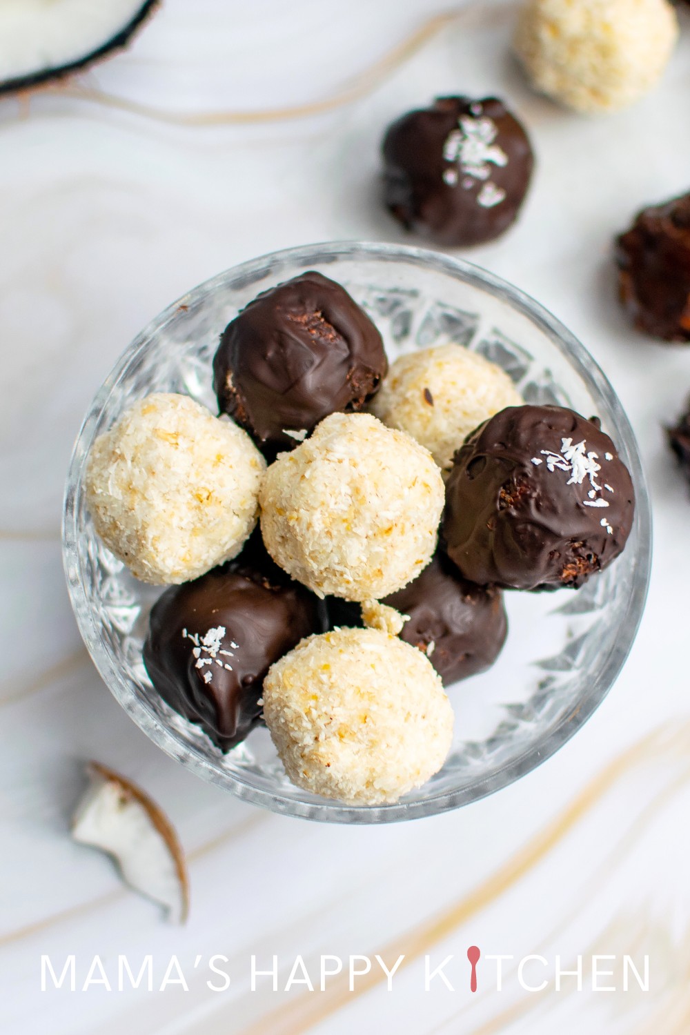 To help out The Husband with his workout routine, I decided to make these healthy bounty bites: chocolate oat balls rolled in coconut. Let me tell you how much I appreciate him working out. :) So I want to encourage him with these are little balls of deliciousness. For an added dose of goodness, you can add some protein powder to the chocolate, which will hide the chalky taste. These healthy bounty balls are also a good snack, a breakfast bite, or a homemade gift for Christmas.