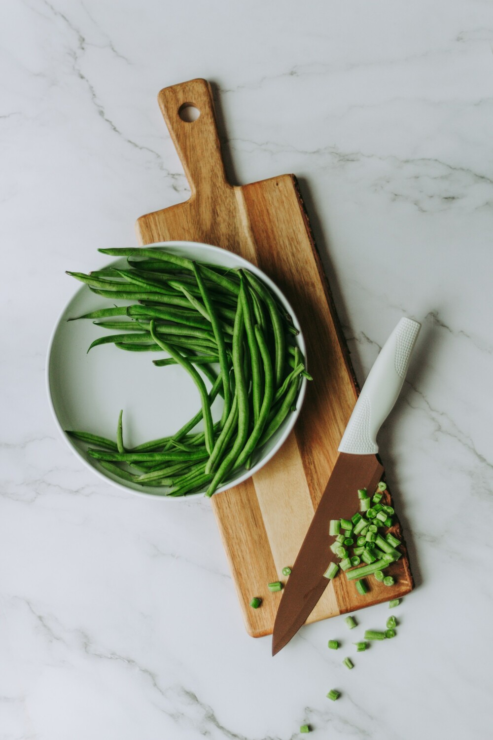 Every summer, I harvest so many green beans from my garden. This air fryer green beans recipe is super simple to make to use up that great bounty. I love fresh green beans (I also love canned green beans, too!), and I throw them into everything. There is just something so satisfying about eating something that you've grown yourself. Green beans are also healthy. In just 10 minutes, you have a delicious snack, side dish, or appetizer. You can even freeze fresh green beans and air fry those too!