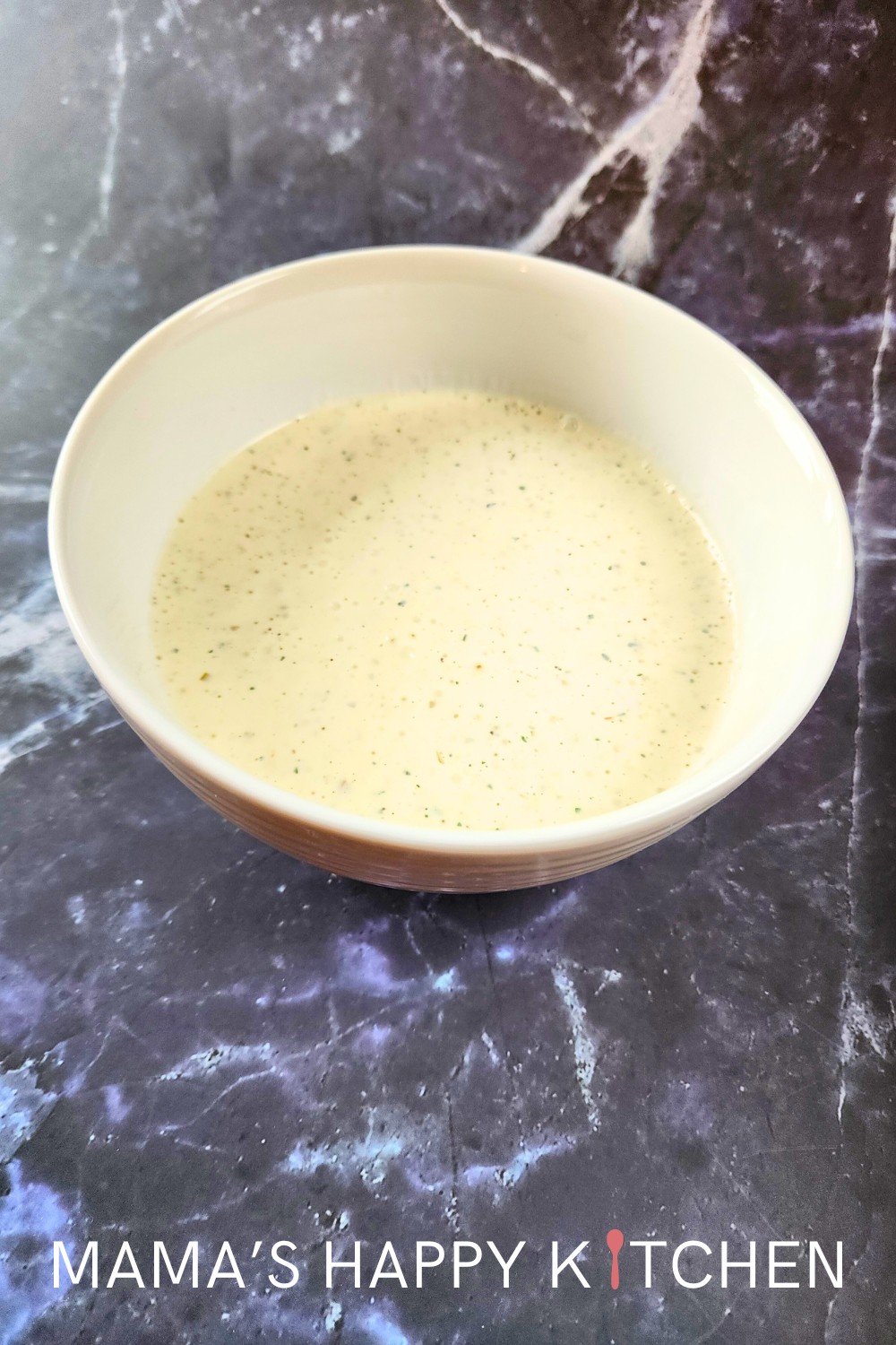 Jimmy Johns recently discontinued their Kickin' Ranch, a cult favorite. I love their sandwiches and especially this sauce, so I had to recreate it. Introducing my Jimmy John's Kickin' Ranch copycat recipe. Kickin' Ranch can be used as a dip for chips or veggies, a condiment for sandwiches, and a drizzle over chicken. Want more heat? Then add more peppers and pepper juice, or give it a bit of cayenne pepper. Want it more dip-y and less sauce-y? Then reduce the half and half. Easy!