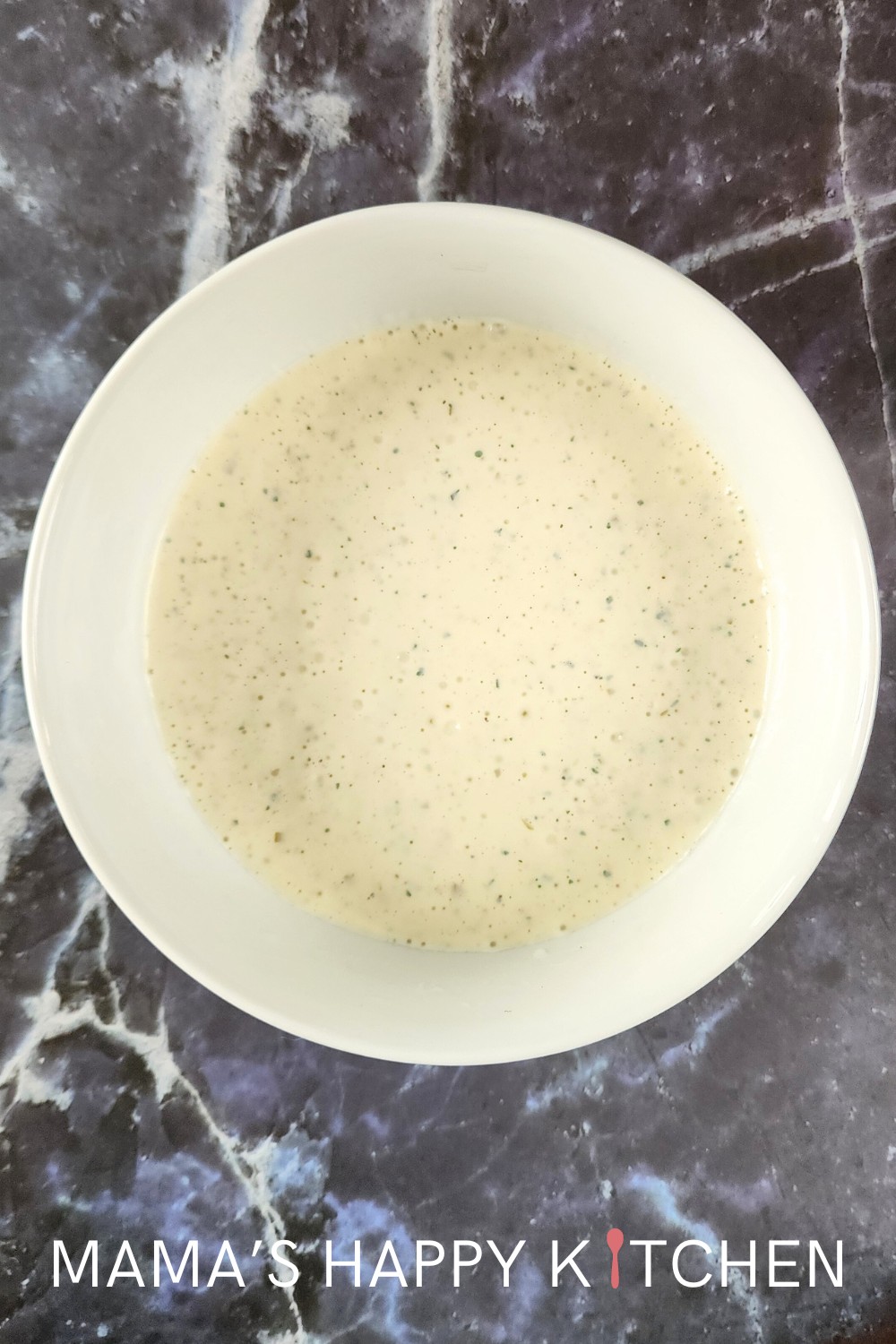 Jimmy Johns recently discontinued their Kickin' Ranch, a cult favorite. I love their sandwiches and especially this sauce, so I had to recreate it. Introducing my Jimmy John's Kickin' Ranch copycat recipe. Kickin' Ranch can be used as a dip for chips or veggies, a condiment for sandwiches, and a drizzle over chicken. Want more heat? Then add more peppers and pepper juice, or give it a bit of cayenne pepper. Want it more dip-y and less sauce-y? Then reduce the half and half. Easy!