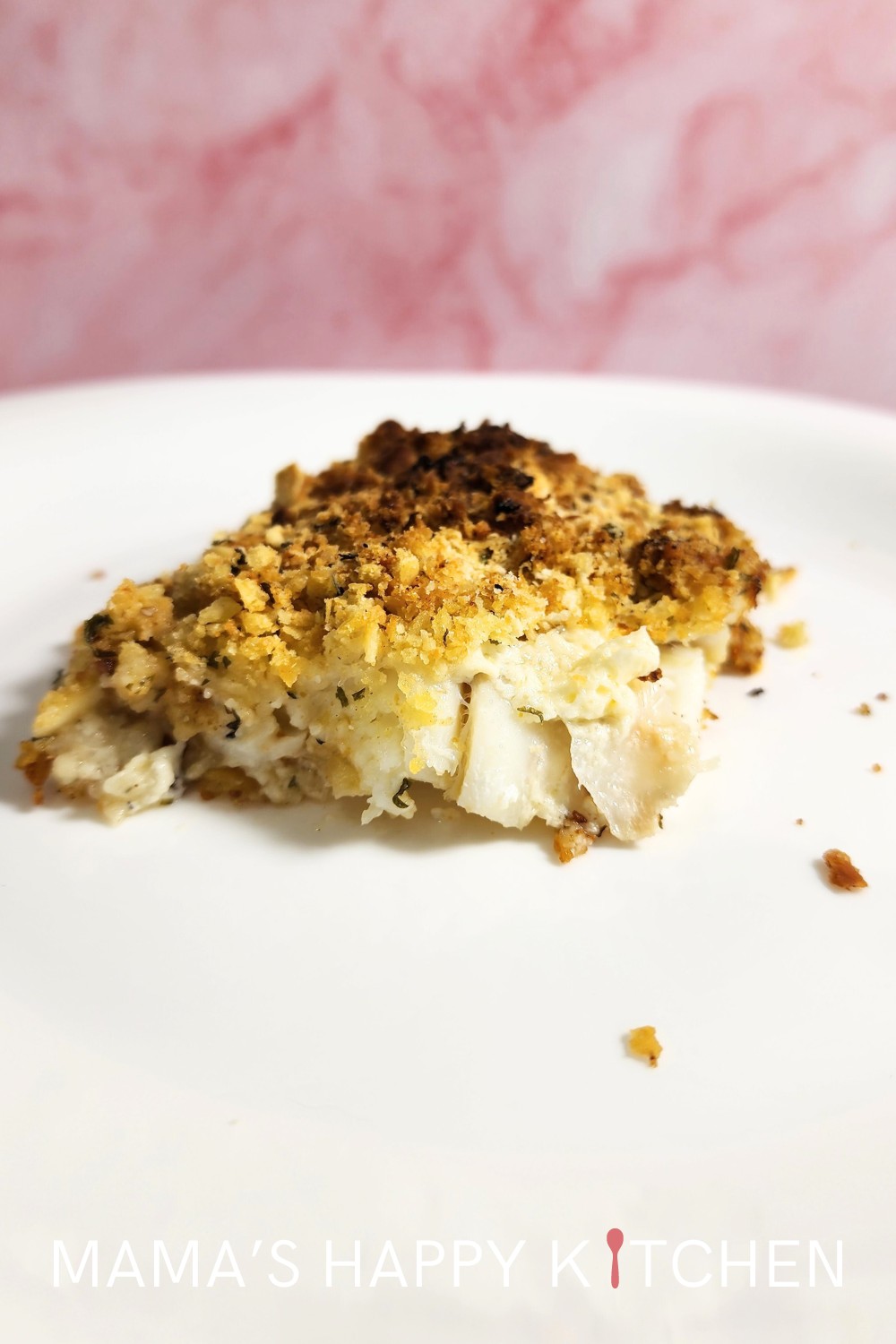 This Healthy New England Baked Scrod with Saltines recipe is perfect for those evenings when you want something special without spending hours in the kitchen. I use an old-school saltine cracker crust, but you can use any kind of topping: oyster crackers, Ritz, or, hold your hats, Cheerios. Yes, Cheerios! It sounds wild, but it works. A quick mix, a spread, a sprinkle, and into the oven it goes. Before you know it, you're pulling out a bubbling, aromatic dish that's sure to impress.