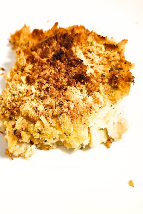 This Healthy New England Baked Scrod with Saltines recipe is perfect for those evenings when you want something special without spending hours in the kitchen. I use an old-school saltine cracker crust, but you can use any kind of topping: oyster crackers, Ritz, or, hold your hats, Cheerios. Yes, Cheerios! It sounds wild, but it works. A quick mix, a spread, a sprinkle, and into the oven it goes. Before you know it, you're pulling out a bubbling, aromatic dish that's sure to impress. 