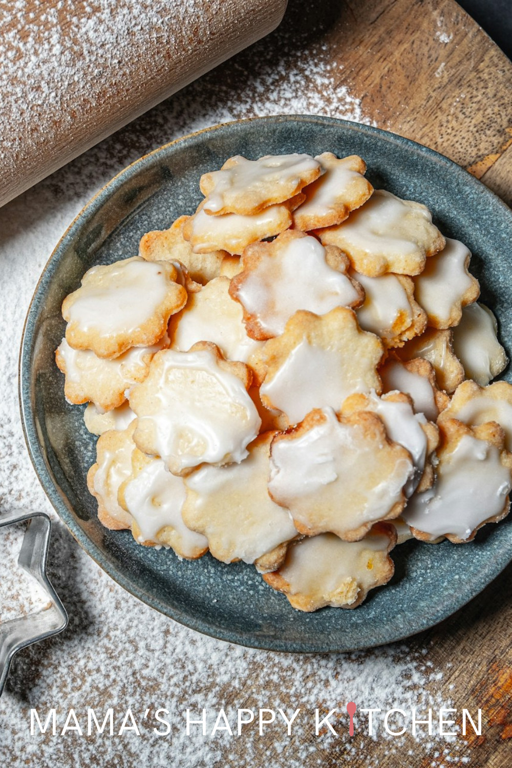 These classic Christmas sugar cookies with vanilla icing make the perfect snack for Santa when he delivers those presents down the chimney (or through the front door, if you don't have a chimney). My daughters get together to bake Christmas cookies every year. They make a version of these cookies. Simple and easy to bake, and with endless ways to decorate. There's something undeniably heartwarming about the ritual of making classic Christmas sugar cookies.