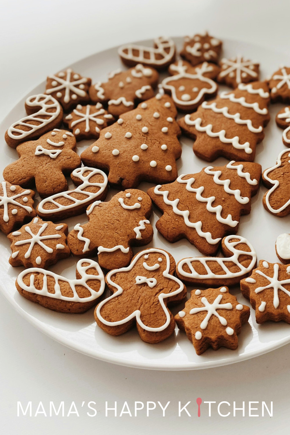 I'm continuing my journey of Christmas cookies with this classic Gingerbread Man recipe. I know you can make houses with these cookies, but I always thought they were too delicious to make decorations out of. So I had to make some of these cookies! We have this place called the Gingerbread Man near my law school. Most people (including all the staff) call it the G-Man. Anyway, I was driving by it the other day and got an inspiration to make some cookies. With it being near Christmas and all.