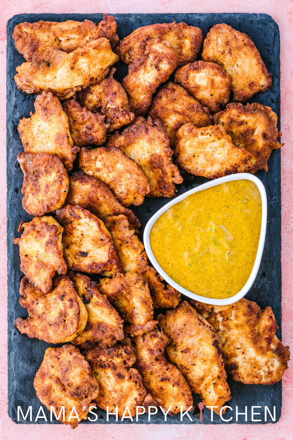 This spicy mustard dipping sauce recipe is so delicious with some "halfway" air fried chicken nuggets. Mustard is just so darned good on chicken. Almost the perfect pair. Not quite as good as French fries and ketchup or peanut and jelly ... but still pretty darned good. This mustard is made from spicy brown, but you could also make it from Dijon or even Coleman's (which has whopping kick). The honey in the dipping sauce adds a sweet counterpoint that tames the mustard's robust character.