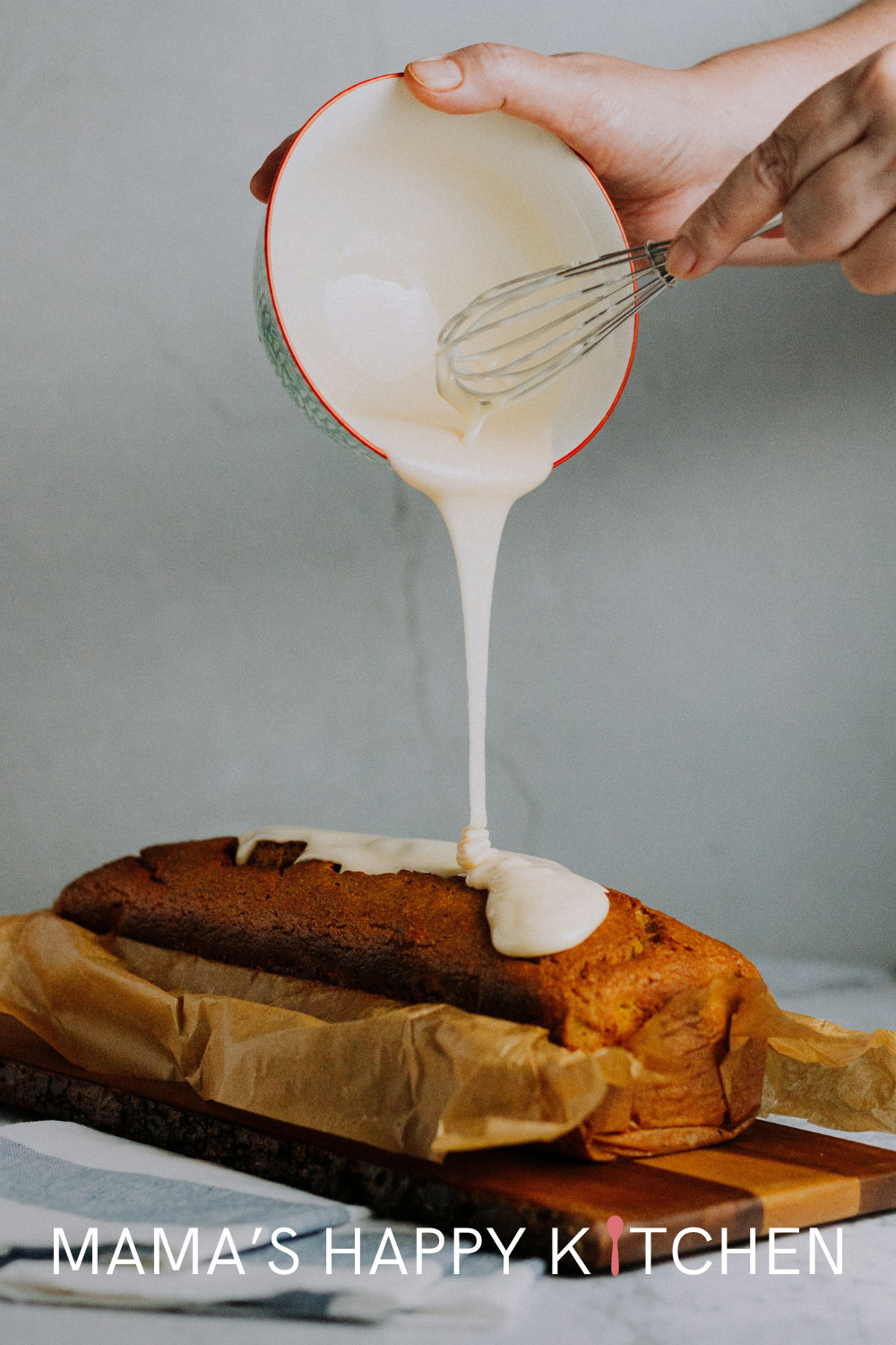 This recipe is for a delicious tangerine loaf cake (or a tangerine bread, I'm not sure which is the better name). It features a vanilla icing that you just drizzle on top, along with poppy seeds for a little bit of protein and crunch. Since it uses baking powder (instead of yeast), it is considered a quick bread. The cake’s batter incorporates fresh tangerine juice and zest, giving it a bright, citrusy flavor that perfectly complements the subtle sweetness of the vanilla icing.