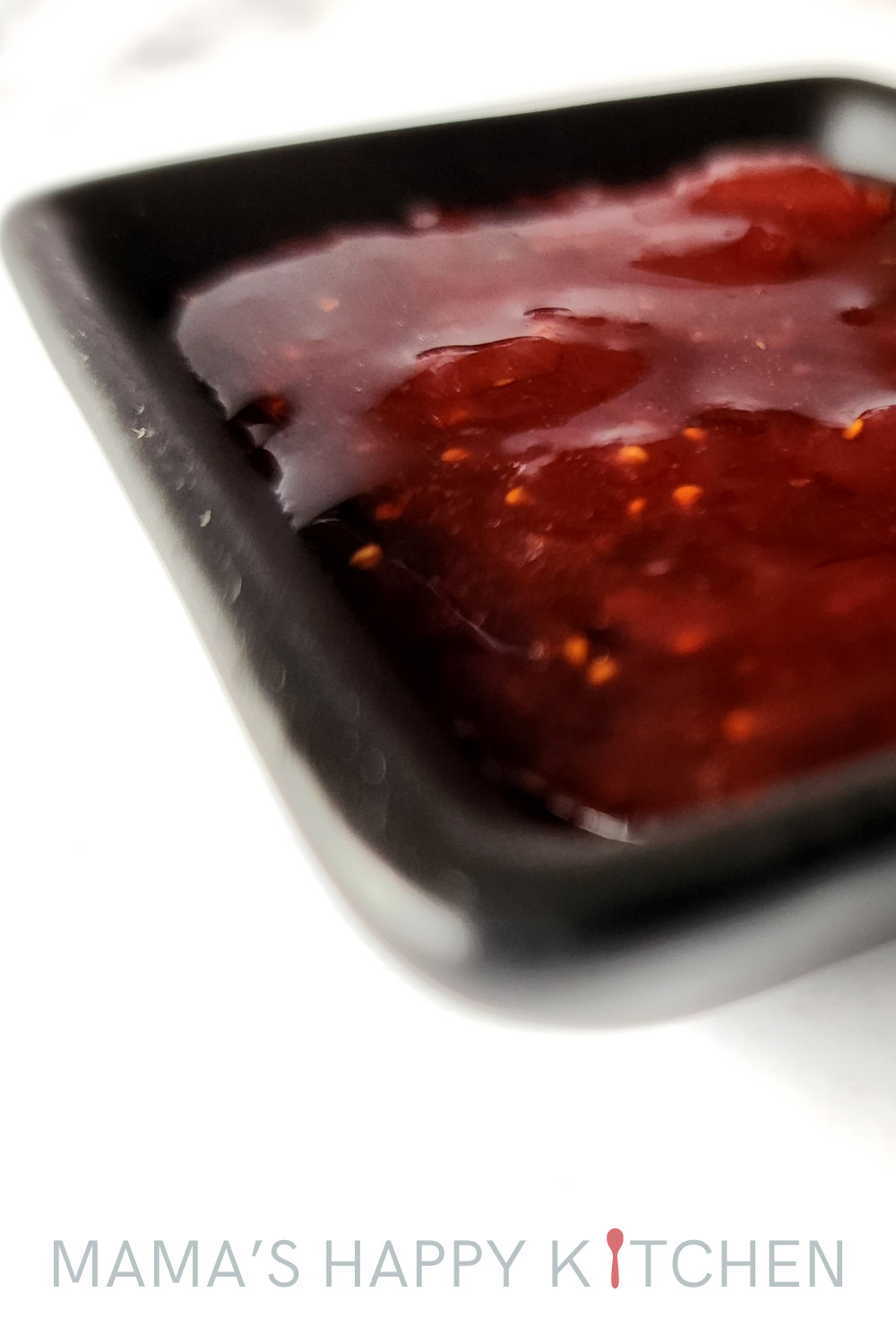 This is a wonderful recipe for how to make homemade strawberry jam. You gotta trust me, it's so much better than the store bought stuff, which contains all sorts of preservative and other yucky stuff. And it only has three ingredients: strawberries, sugar, and lemon juice. I love to collect strawberries from my patch of evergreens. They are bursting with flavor ... but I don't get that many of them. I freeze them and make this jam. But don't worry, you can use store bought strawberries, too.