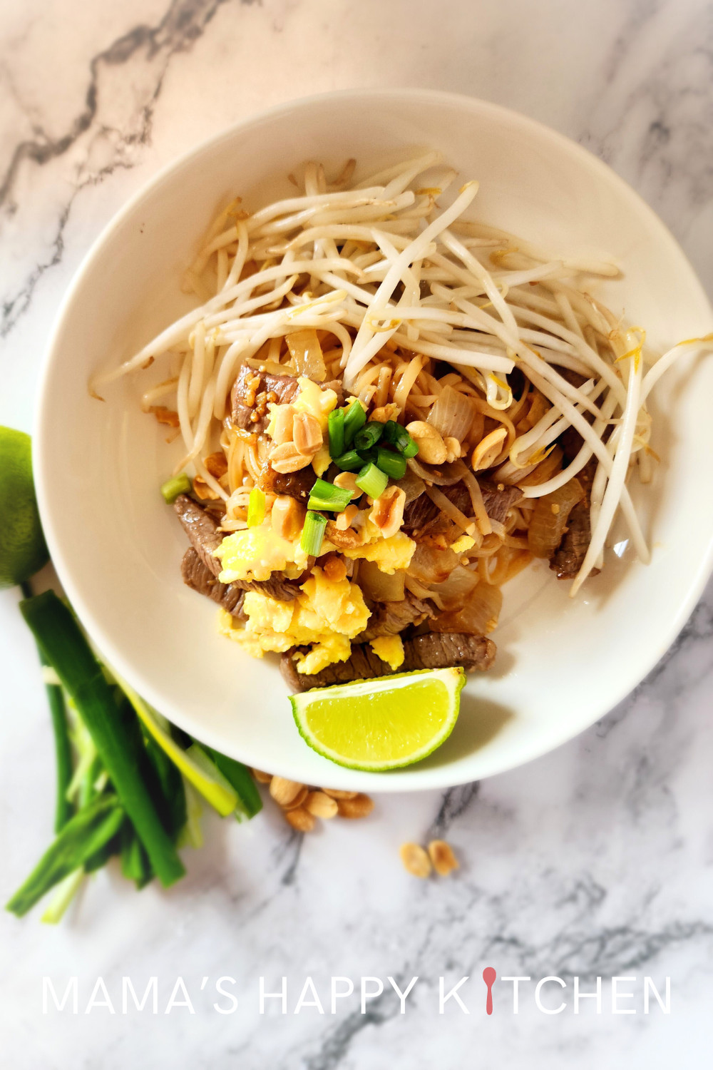 This beef Pad Thai recipe features thinly sliced pieces of cooked beef, rice noodles, and my special Pad Thai sauce without tamarind. It's very similar to my chicken and shrimp Pad Thai, but made for beef lovers. Although beef can be expensive, this recipe has just one pound of it, so it goes a long way. Fresh vegetables like bean sprouts, carrots, and green onions add crunch and color, making the dish both visually appealing and nutritionally balanced, but also to help counteract the salt.