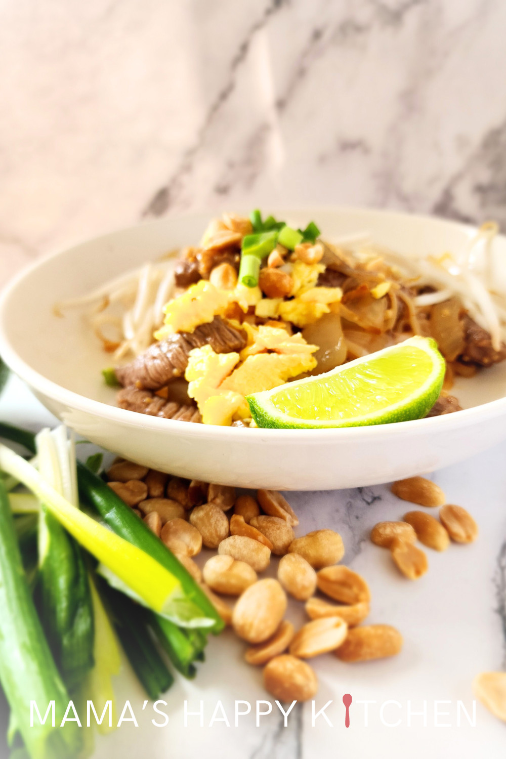 This beef Pad Thai recipe features thinly sliced pieces of cooked beef, rice noodles, and my special Pad Thai sauce without tamarind. It's very similar to my chicken and shrimp Pad Thai, but made for beef lovers. Although beef can be expensive, this recipe has just one pound of it, so it goes a long way. Fresh vegetables like bean sprouts, carrots, and green onions add crunch and color, making the dish both visually appealing and nutritionally balanced, but also to help counteract the salt.